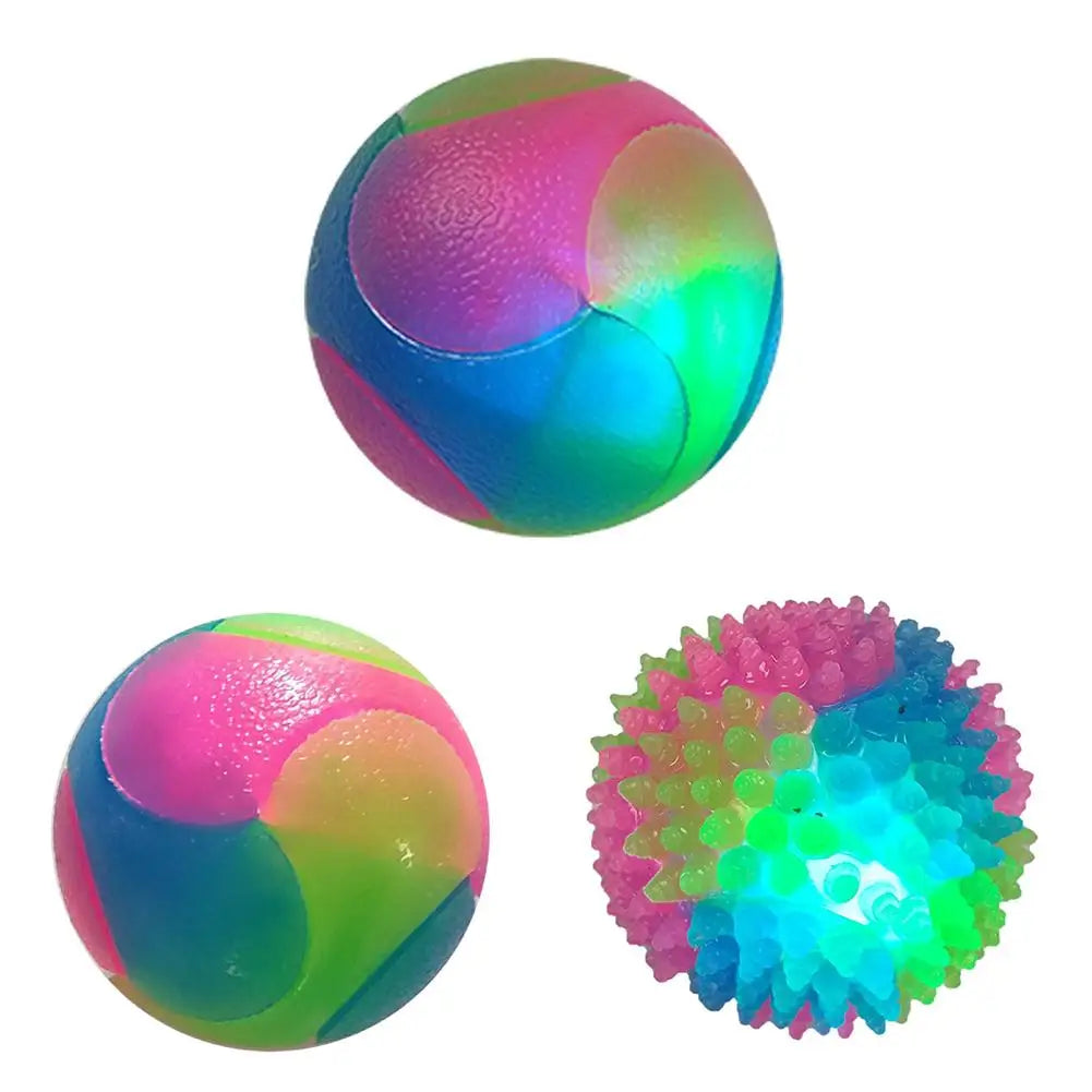 A colorful, translucent interactive glowing fetch ball for pets, shown in three views.