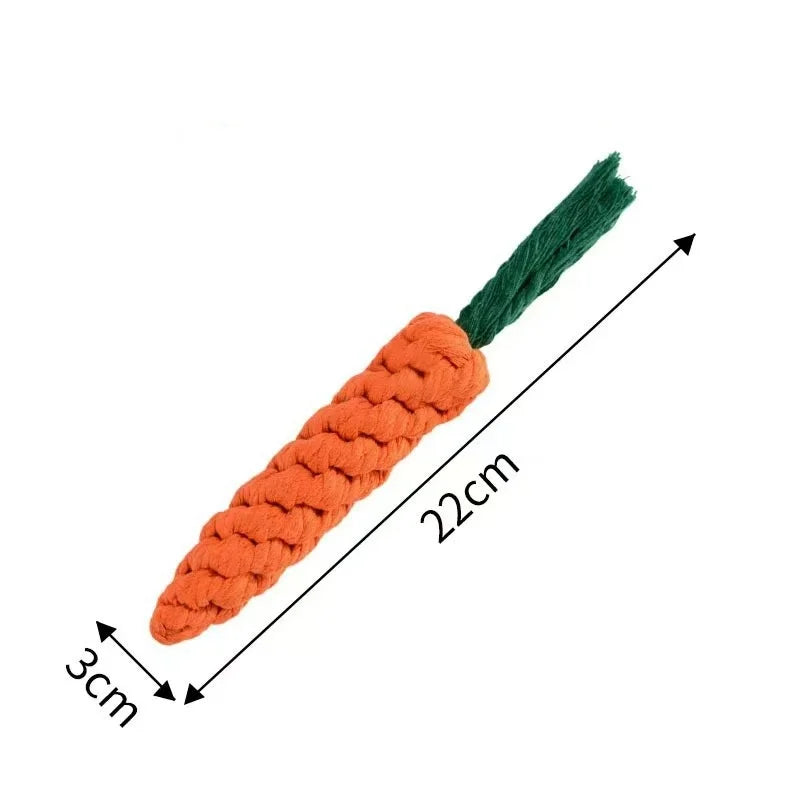 An orange plush carrot teething toy with a green stem and anti-scratch design.