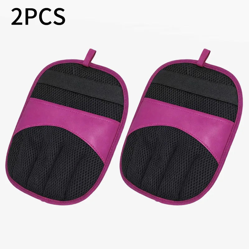 A pair of reusable pet hair removal gloves in pink and black.