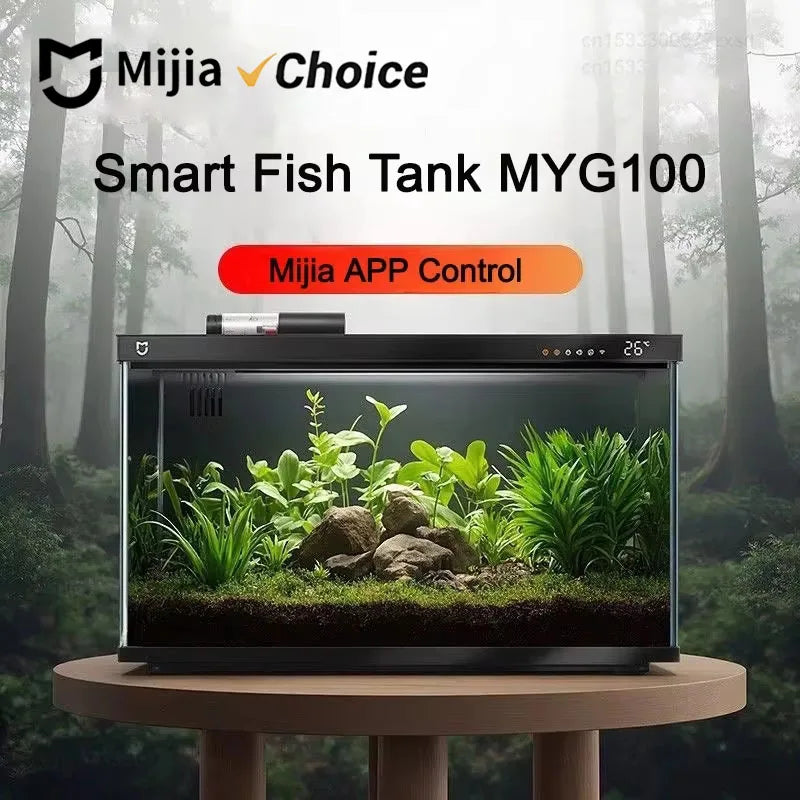 حوض سمك ذكي، موديل MYG100، معروض في حوض زجاجي مليء بالنباتات والصخور المائية الوفيرة.