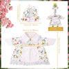 A white and floral outfit for a porch goose, featuring pink roses and decorative elements.