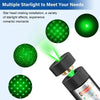 A green laser pointer training torch is shown with a rotating star head, emitting a bright green light.