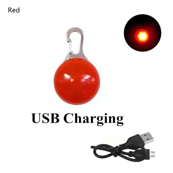 A red, spherical LED light designed for a dog collar, shown next to a USB charging cable.