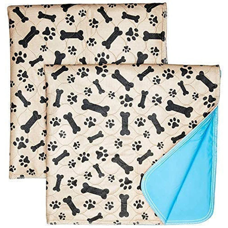 A beige patterned reusable dog pee pad with a blue absorbent training mat attached.