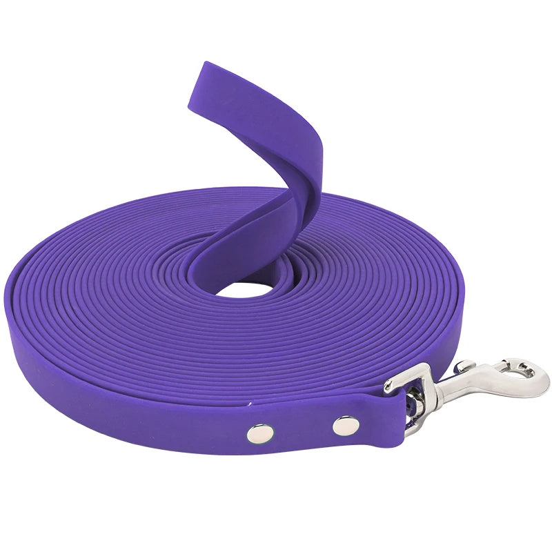Purple heavy-duty waterproof dog leash coiled and attached to a metal clip.