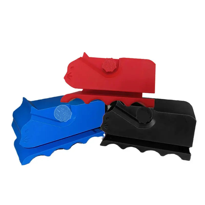 Three handheld cardboard strip cutters in red, blue, and black for DIY projects