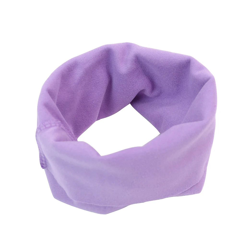 A purple dog earmuff hat designed for warm noise-shielding ear cover for small, medium, and large dogs.