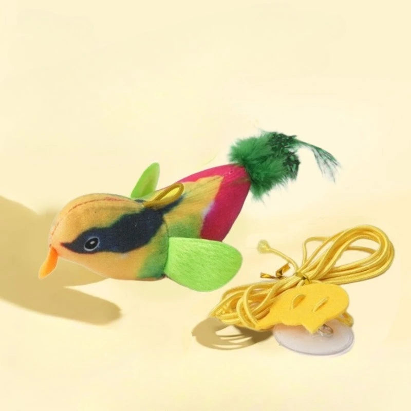 Plüschtier-Vogel-Katzenspielzeug in gelben, rosa und grünen Farben mit einem flauschigen grünen Federleitfell.