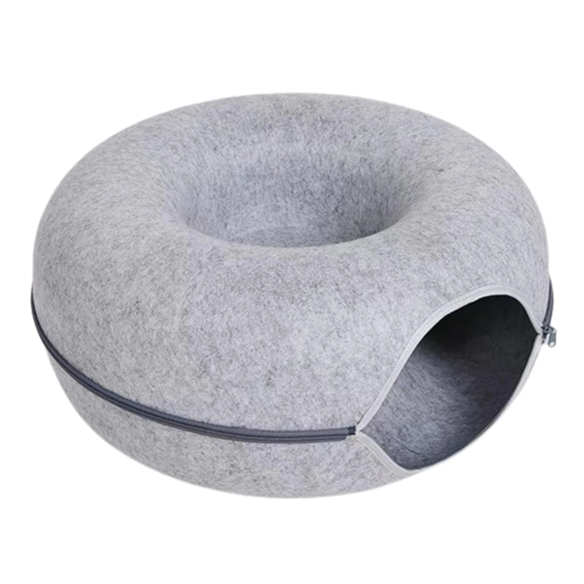 A round, gray cat bed shaped like a donut with an entrance tunnel.