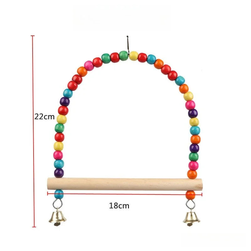 Wooden bird swing with colorful beads and hanging bells on a wooden bar.