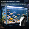 A cleaning brush with powerful magnets is shown inside an aquarium filled with various fish and aquatic plants.