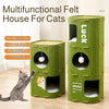 A green felt house for cats with multiple levels and a scratching board, shown next to a cat.
