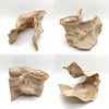 A light beige rock formation ornament designed to resemble natural terrain for an aquarium.