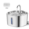 A stainless steel automatic cat water fountain with a visible water stream and a filter component.
