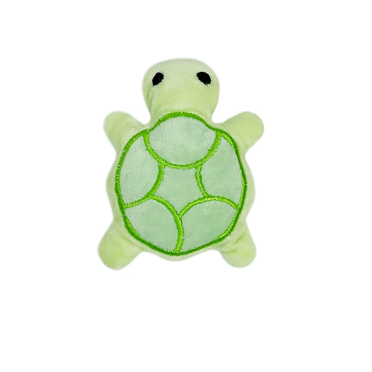 Hellgrüßiges Plüschtier in Form einer Schildkröte mit strukturierter Schale und kleinen Augen.