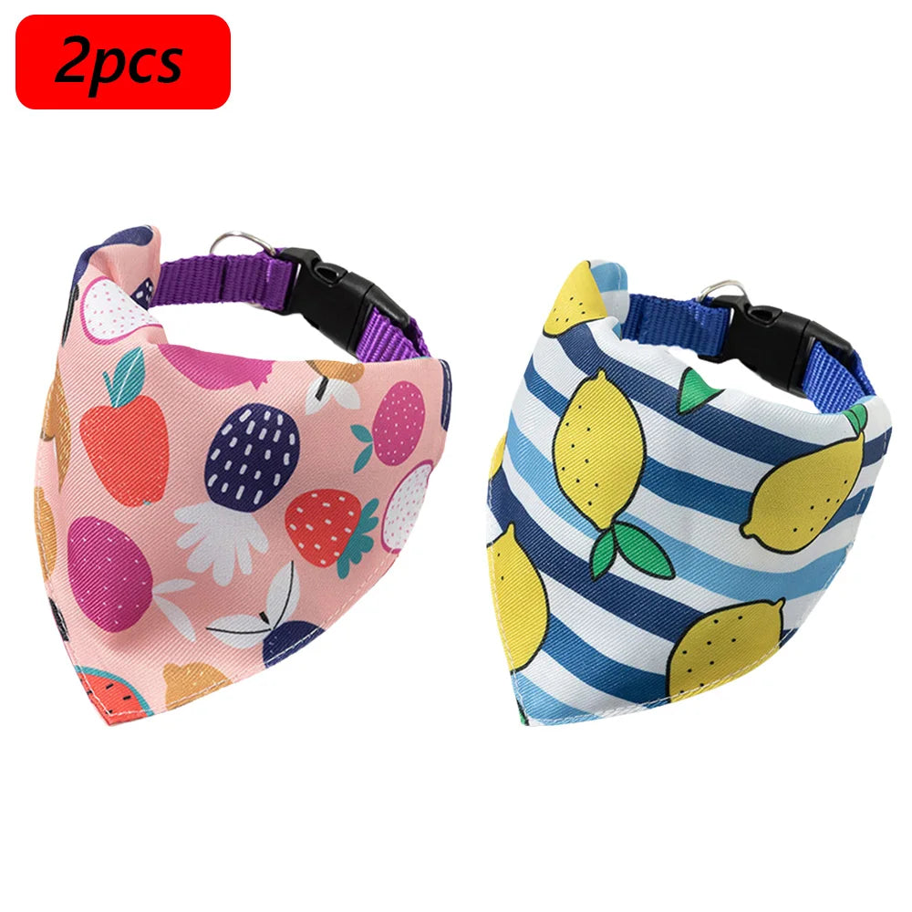 A pair of printed pet collars with matching bandanas for small dogs and cats, featuring fruit patterns.