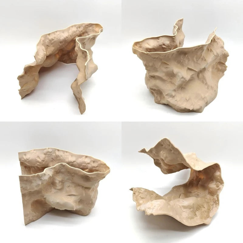 A light beige rock formation ornament designed to resemble natural terrain for an aquarium.