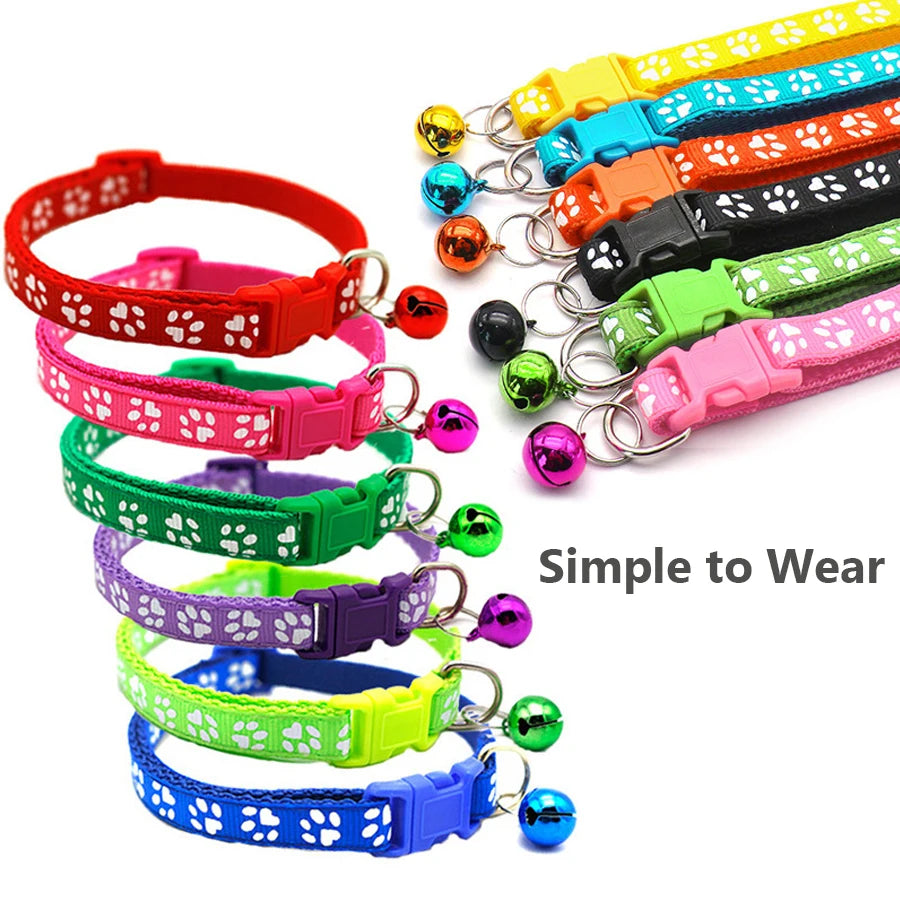 Assortment of colorful adjustable pet collars with bells for dogs and kittens