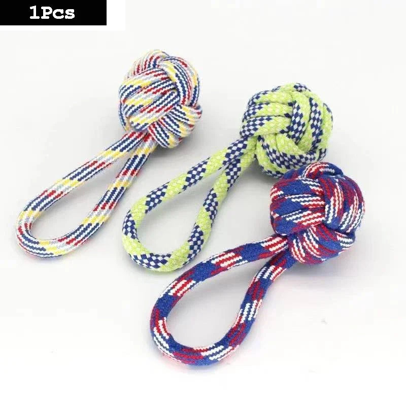 A set of three interactive cotton rope dog toys shaped like a carrot, dumbbell, and other forms.