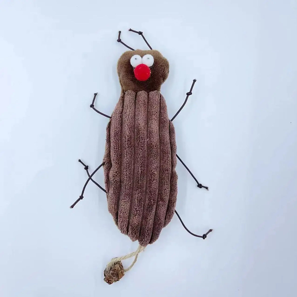 A plush toy resembling a cockroach with antennae and a red mouth, made for cats.