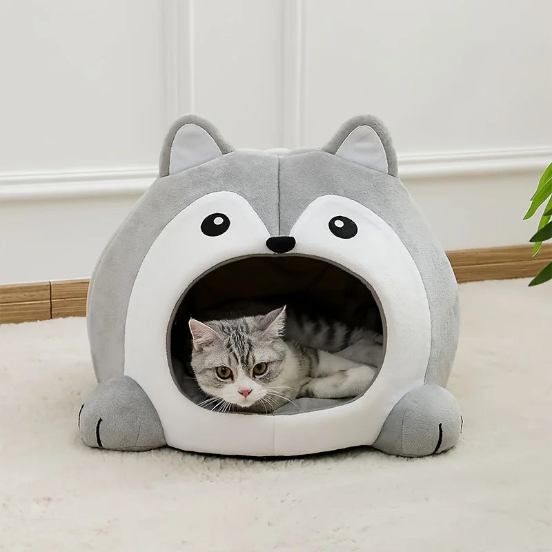A gray and white plush tent house shaped like a cat cave for pets.