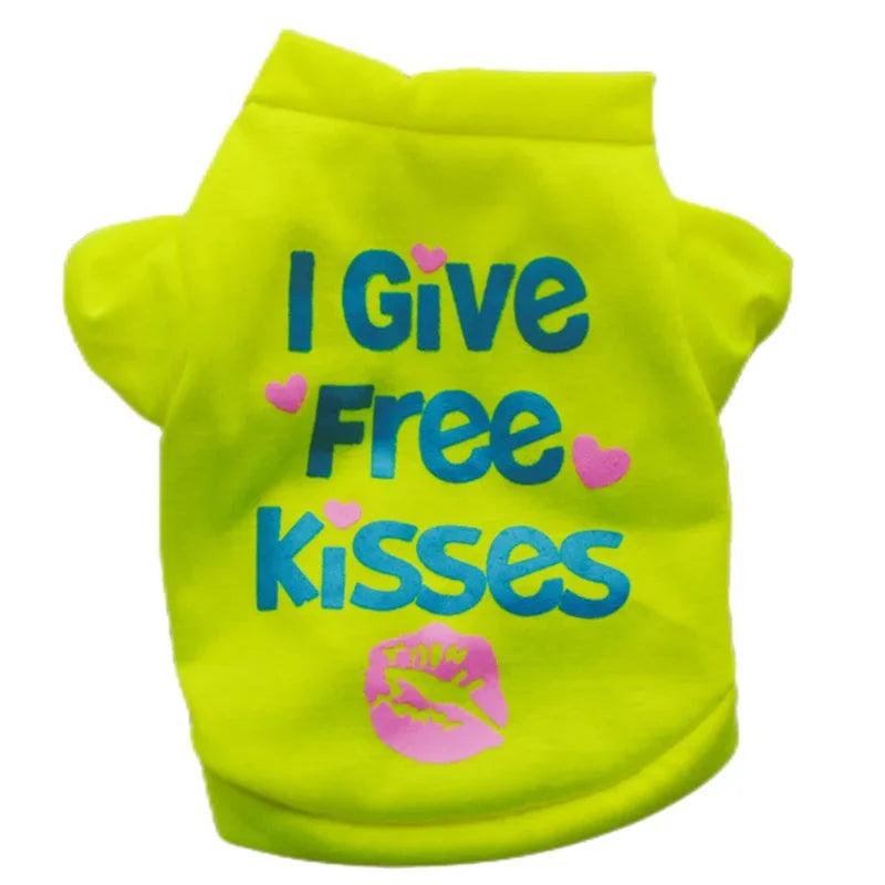 Neon yellow dog vest with the text I Give Free Kisses printed on the back