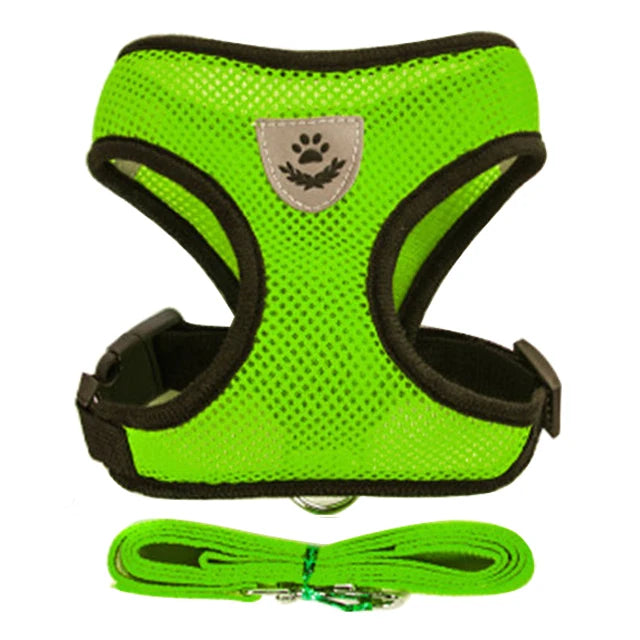 A bright lime green adjustable pet harness and leash set with a paw print design.