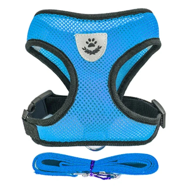 A bright blue pet harness and matching leash set with a gray paw print design.