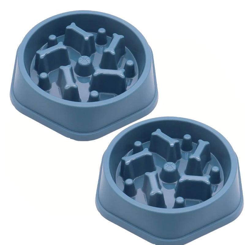 A light blue slow feeder dog bowl with a textured silicone insert and anti-slip base.