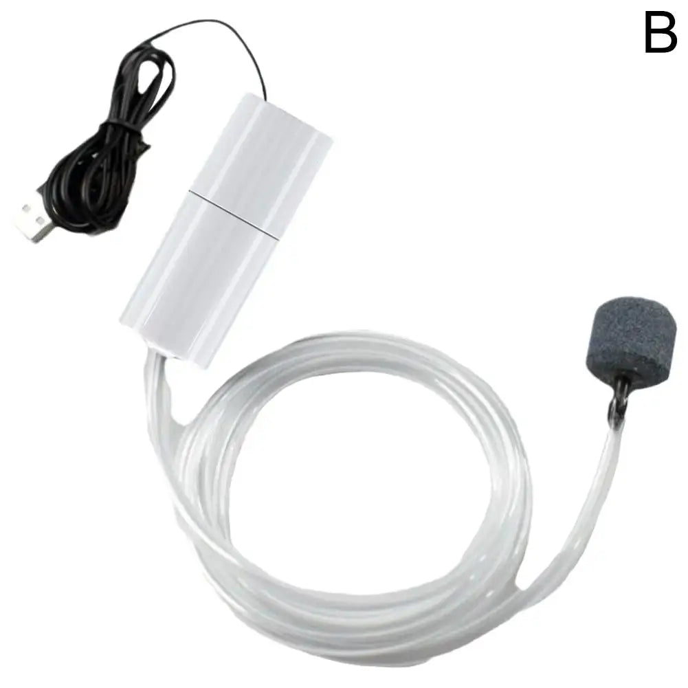 Pompe à air d'aquarium USB blanche avec pierre à air et tuyau souple transparent.