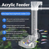 Acrylic feeder with a suction cup, aggregate tray, and hook design for feeding fish in an aquarium.