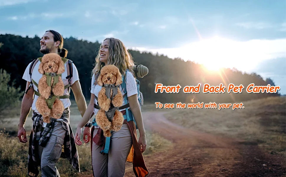 A woman and a man walking on a dirt road with a front and back pet carrier backpack.