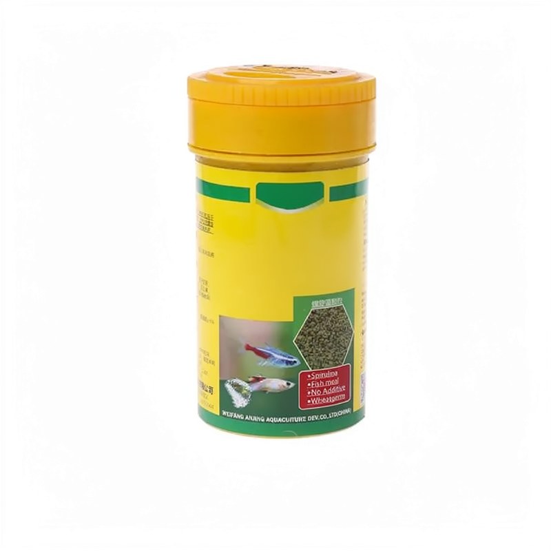 Conteneur jaune de granulés d'alimentation pour poissons tropicaux enrichis en spiruline