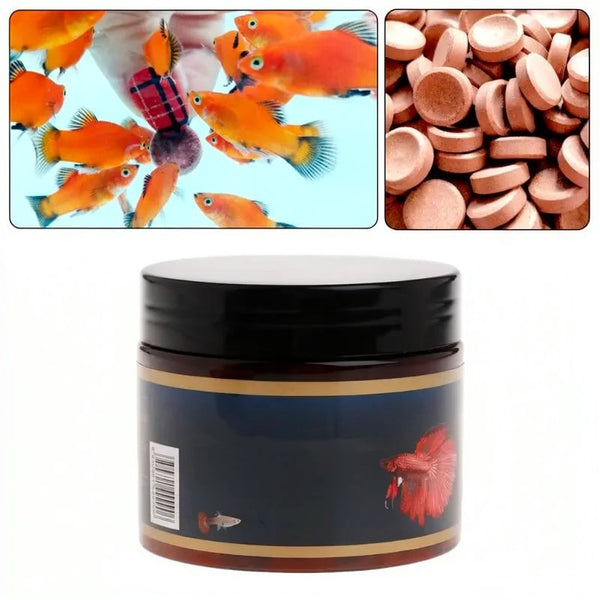 A jar of orange fish food tablets with a dark lid and a red fish decoration.