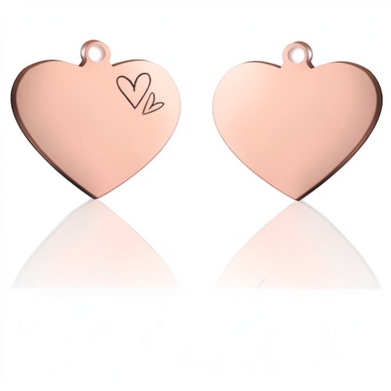 Two rose gold heart-shaped stainless steel pet ID tags with a small heart engraving