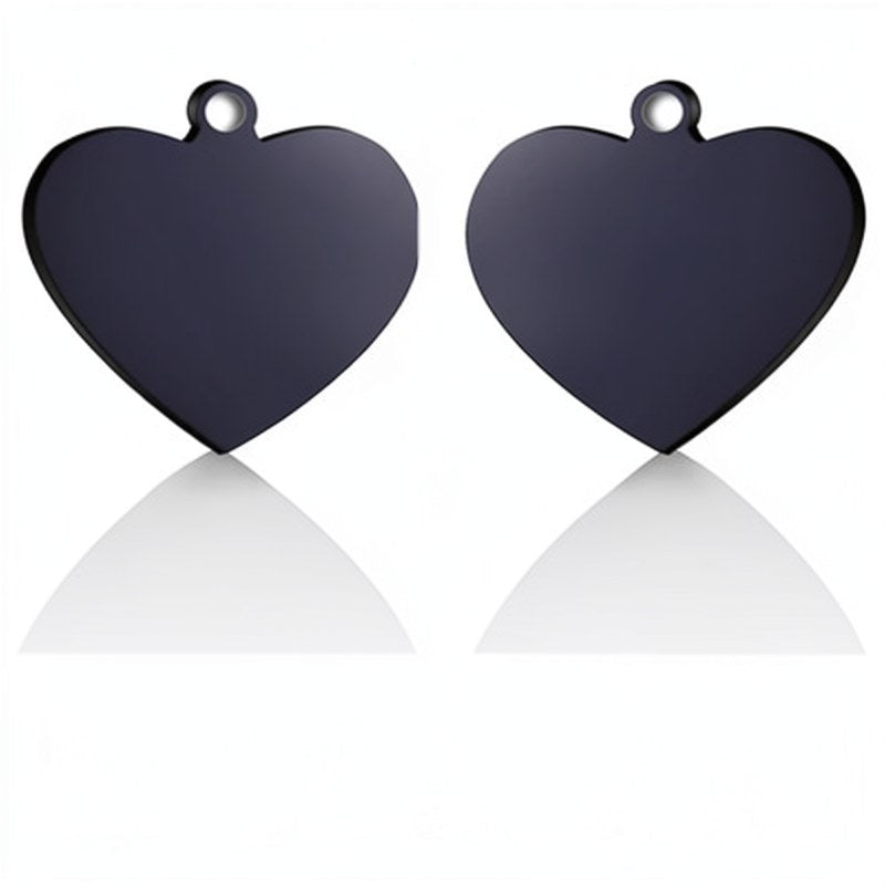 A pair of dark gray heart-shaped stainless steel pet ID tags with loops.