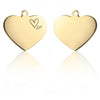 Two gold-colored heart-shaped stainless steel pet ID tags with a small heart design etched on them.