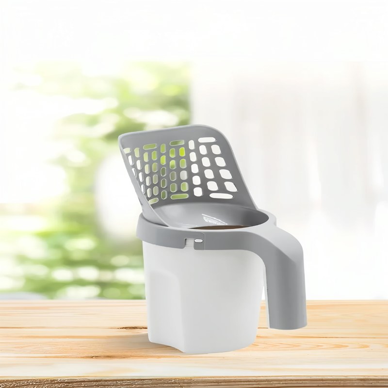 Pala para arena de gato de una sola pieza con soporte integrado para bolsas