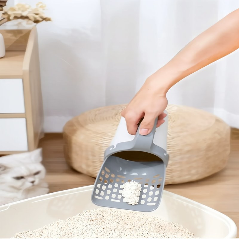 Pala para arena de gato de una sola pieza con soporte integrado para bolsas