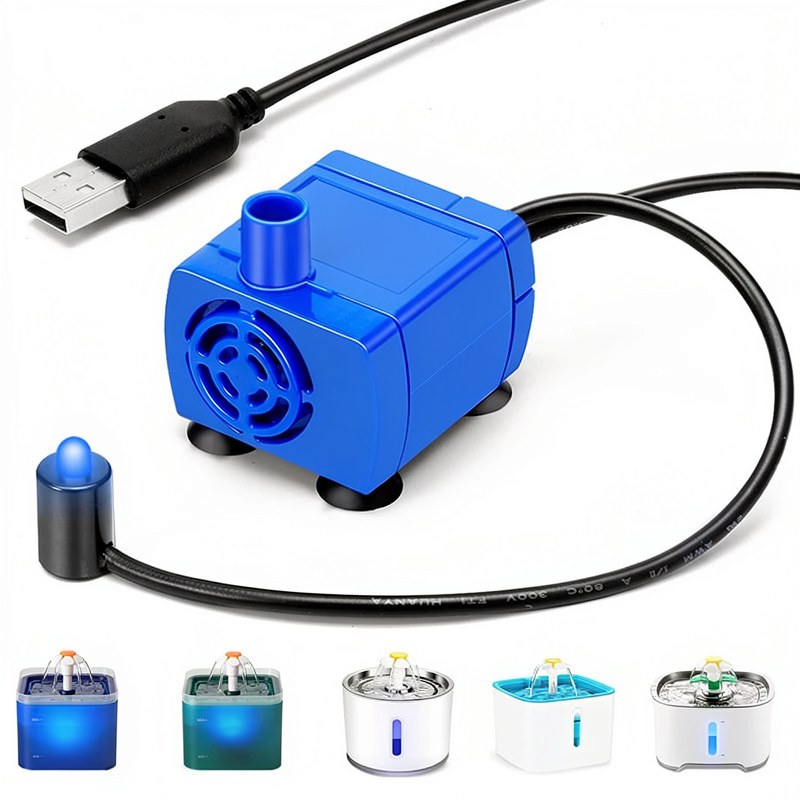 Pompe de remplacement bleue USB pour fontaines à eau de chats avec câble noir et composants de la fontaine.