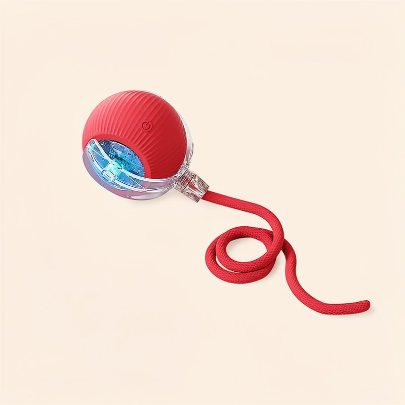 Balle pour chat interactive rouge et intelligente avec composant en verre clair et cordon flexible.